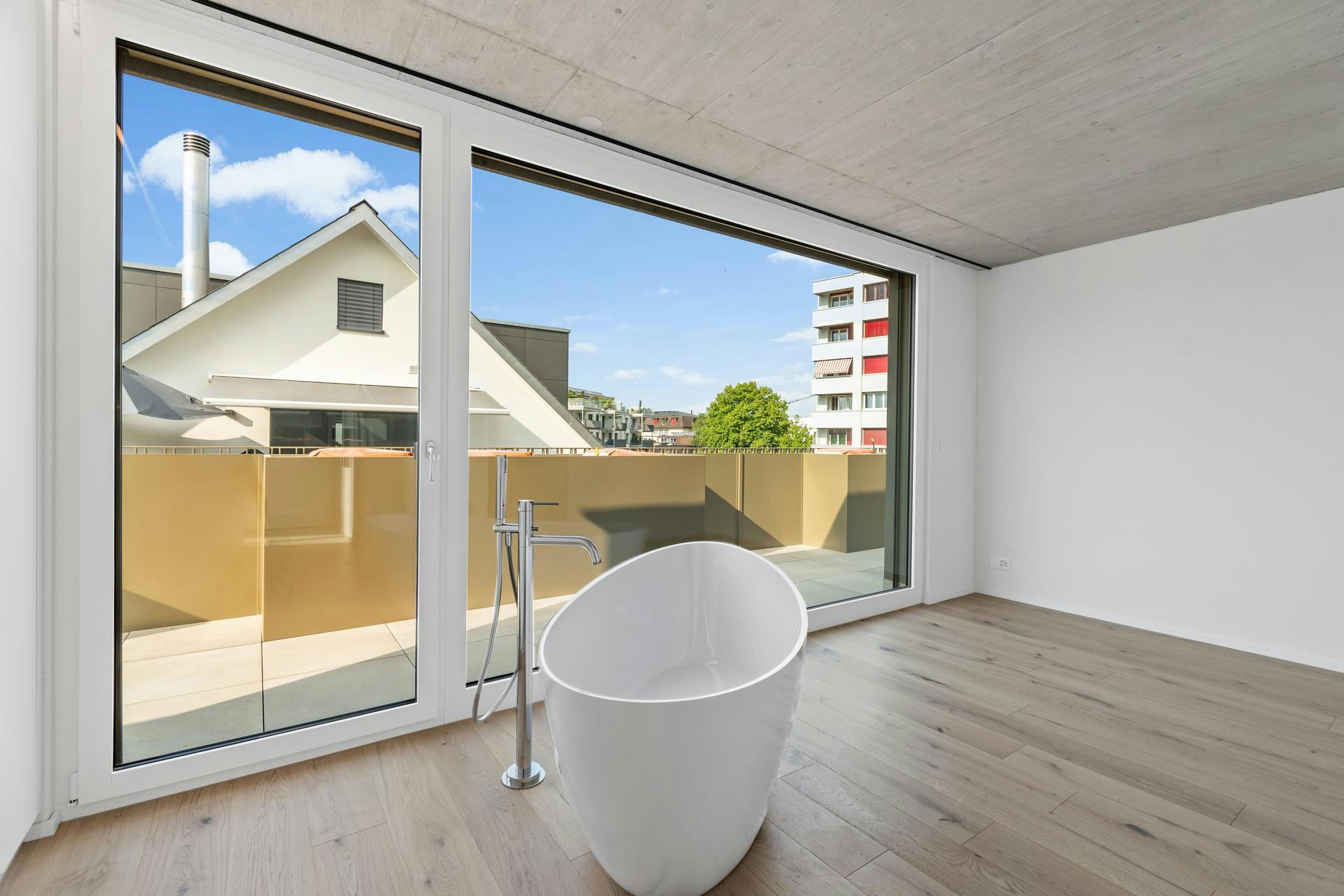 Planning and concept of the multi-family house Papillon in Freienbach by the architectural office N2A.